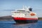 Big passenger cruise ship sails in fjord