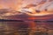 Big passenger ferry ship on sunset background in Vlore city port. Wonderful sunset on Adriatic Sea in western Albania, Europe.