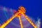 The big pendulum in the amusement park at night.