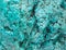 Big piece of a natural stone of turquoise background.