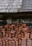 Big pile of older type roof tiles