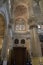 Big pillars, vaults and stained glass windows in Malaga Cathedral, Spain