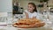 Big pizza with Cute Little Kid Girl