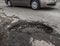 Big pothole in road