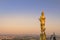 Big public big golden buddha statue standing in Wat Phra That Kao Noi at Nan province Thailand in sunset