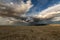 Big puffy clouds over a parched desert