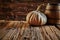 Big pumpkin and oak barrel in wooden room