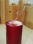 Big red extinguished candle