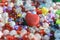 Big red heart surrounded by sequins, beads and other shiny treasure a