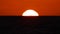 Big Red Hot Sun in Warm Air Distortion Above Ocean Horizon, Sunset over the sea, Travel, Beginning, Nature Concept