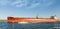 Big red oil tanker passes through the Suez Canal