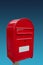 Big red postbox with white empty note space for address at gradient blue sky background, closeup, details