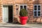 Big red pot in front of the Schleswig Holstein house in Schwerin