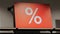 A big red sign with a percentage sign. White percent sign on a red background. big sale