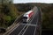 A big red truck on the Chiers viaduct in Longwy in Meurthe et Moselle