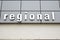 Big regional sign on grey background on the side of a collage building