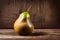 Big ripe pear. Pear on a wooden background close-up. AI generated