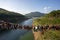 big river mountain landscape forest sky many padlocks are hanging in the foreground. The concept of preserving nature. not to