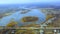 Big river with wild islands overgrown with trees and grass