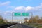 Big road sign with directions to the city of Trieste and Udine i