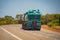 Big Road Train in the Australian Outback with trailer bringing fuel to gas