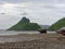 Big rock in hemisphere, cone, or pyramid shape eroded by sea water at Khao Lom Muak, Ao Manao, Prachuap Khiri Khan