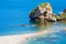 Big rock and narrow path connecting Isola Bella island to mainland Taormina beach, Sicily, Italy