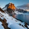 Big rocky mountain snowy tops, pristine lake and sunrise