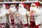 Big Santa Claus toys are on the shelf in the store