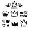 Big set of silhouettes of crowns. Black grunge icons. Painted by hand with a rough brush. Vector illustration. Isolated on white b