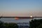 Big ship in Parana River, seen from the promenade in Rosario, Argentina during sunset