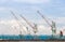 Big shippingbuilding with a lot of crane in the gulf of Thailand