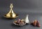 Big size,luxury dry date fruit in stylish,metal bowls on the dark surface.