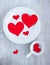 Big and small hearts on the white china dishes