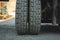 big spiked wheels of yellow tractor durable rubber tires