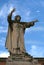 Big statue of Savonarola Girolamo in Ferrara in Italy with blue