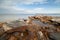 Big stone on seacoast during outflow . landscape