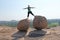 Big stones in Hampi, Karnataka, India. Virupaksha temple. A man stands dangerously between stones. Extreme