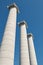 Big, strong stone columns on the street in Barcelona in Spain from bottom view, hill Montjuic