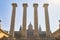 Big, strong stone columns on the street in Barcelona in Spain, hill Montjuic. In a background the National Museum of Catalonia