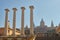 Big, strong stone columns on the street in Barcelona in Spain, hill Montjuic. In a background the National Museum of Catalonia