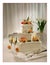 Big sweet multilevel wedding cake with flowers