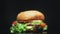 Big and tasty burger is rotating on the plate. Isolated footage