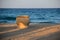 Big terra cotta pot on sandy beach