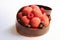 Big textured raspberry dessert with chocolate border and fresh berries on white background