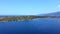 Big tropic island in blue open sea. Aerial view