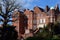 Big typical English building made of brown brick at Eastbourne city