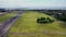 A big unmarked commercial plane landing at Bali International Airport. Close up Aerial drone footage. top view. Huge