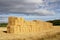 Big wall of straw bales