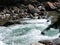 Big waterfall wild stream in the mountains of austria